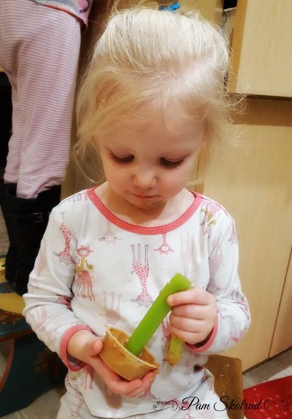 17-letting-sissy-help-while-she-munches-on-celery-and-peanut-butter