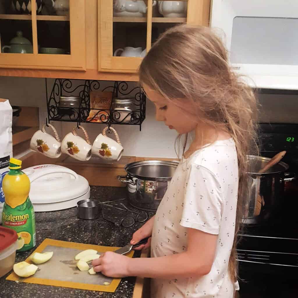 Canning - Nora slicing apples